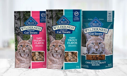 Image of three bags of blue wilderness cat treats